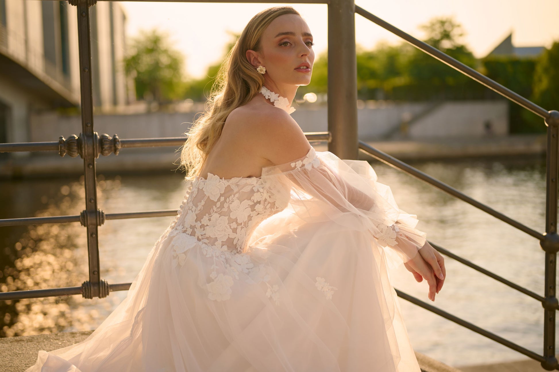 Belariana wedding dress by Lina Becker Germany, 3D floral appliqués, visible corset boning, softly flowing tulle