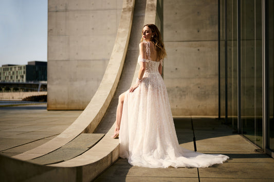 Cosimare wedding dress by Lina Becker Germany, Deep V-neckline with illusion insert