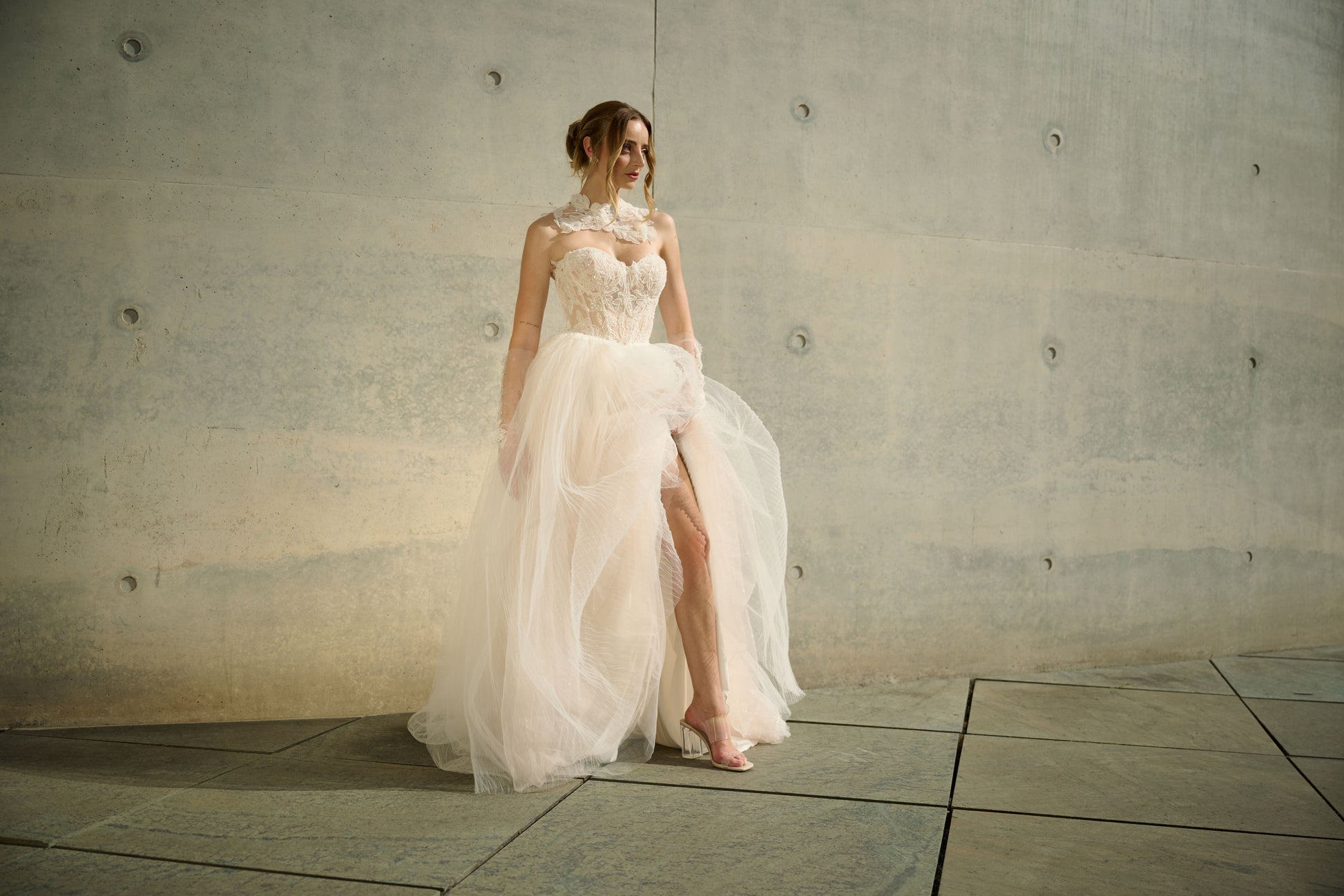 Aurynnesse wedding dress by Lina Becker Germany, Floral lace appliqués, sheer bodice, voluminous soft tulle skirt